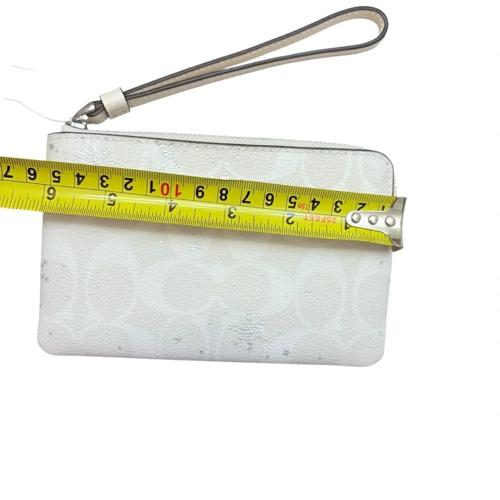 Coach white snowflake signature Wristlet bag